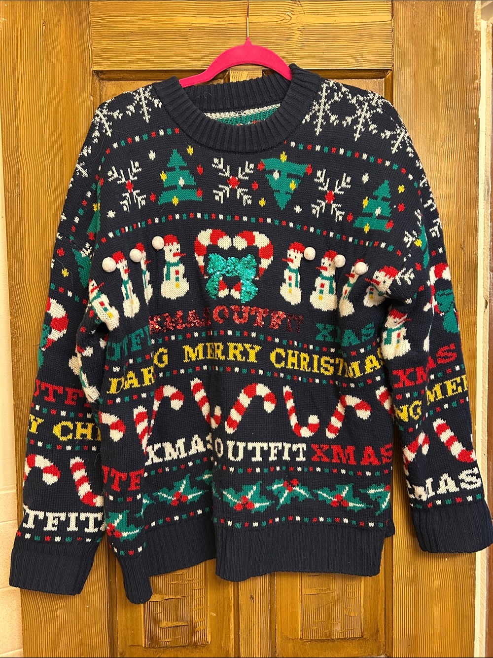 Navy Christmas Sweater with Festive Motifs